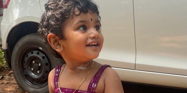 A happy family after using mySunar's ear piercing service.